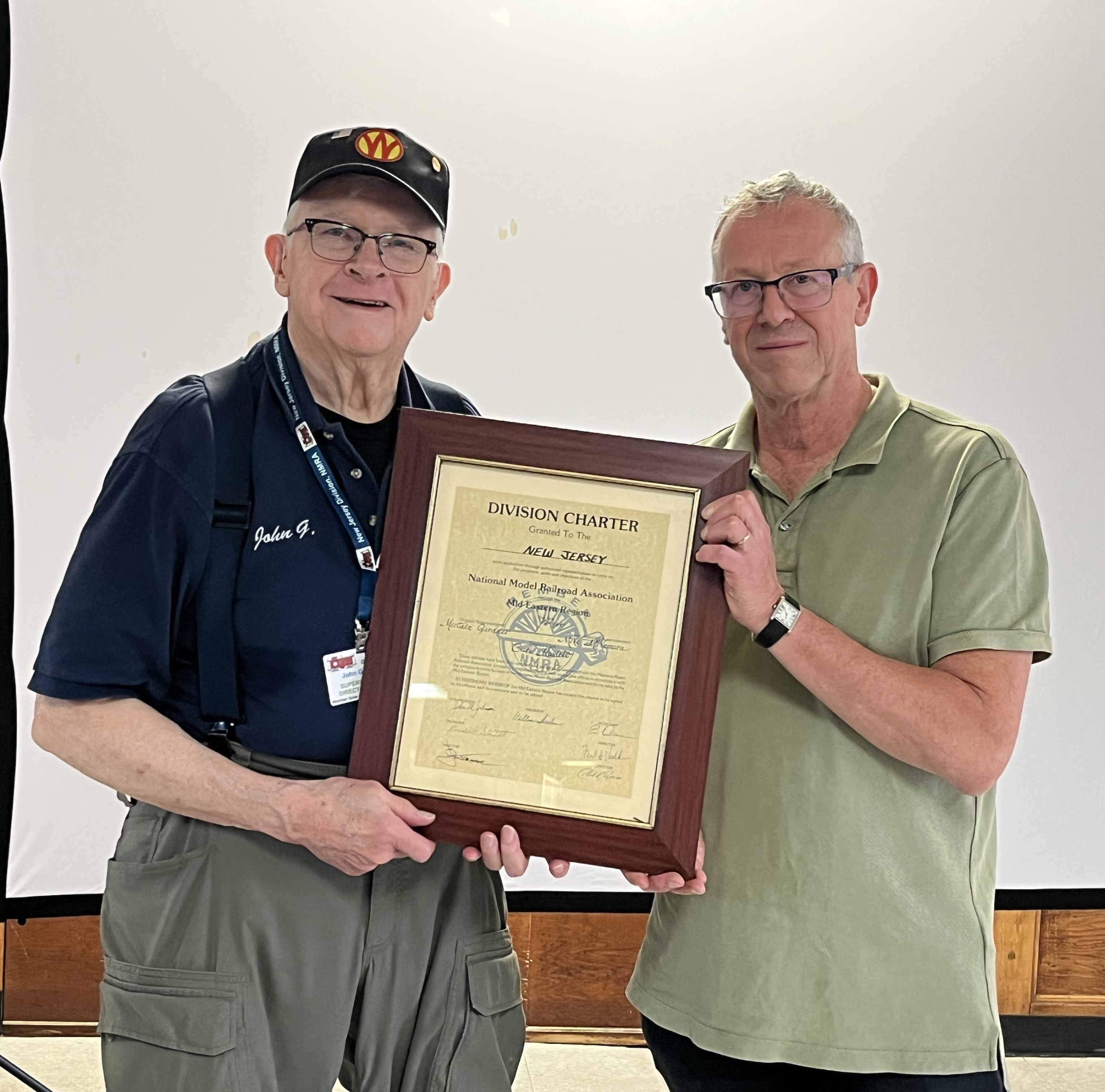Past Superintendent John Gallagher passes the NJ Division Charter to incoming Superintendent Glyn Thomas,MMR